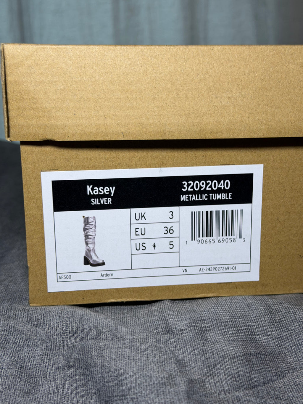 Dr. Martens Kasey Silver Metallic Slouch Heeled
Boots EU 36