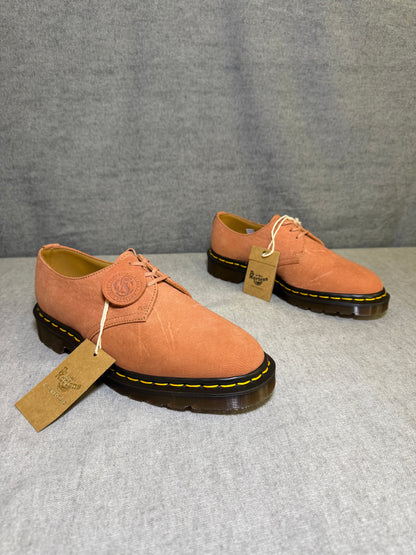 Dr. Martens Made in England 1461 3-eye oxford shoes in pink Savannah Nubuck leather with yellow stitching and a C.F. Stead leather swing tag.
